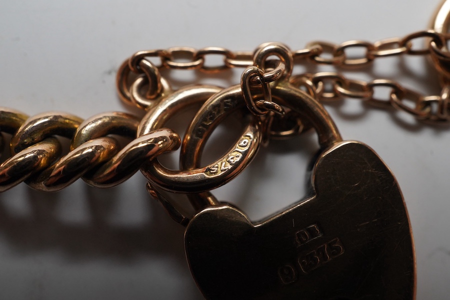 A 9ct god curb link bracelet, with heart shaped padlock clasp, 18cm, 13.8 grams. Condition - fair to good